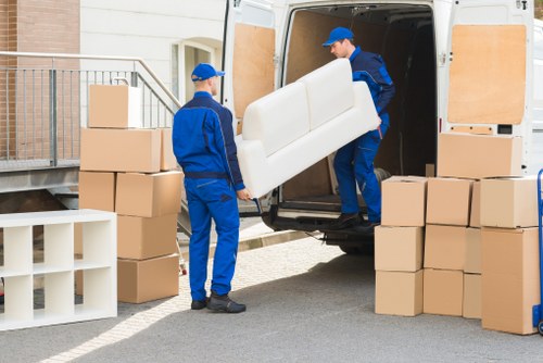 Staff member checking safety around a moving job