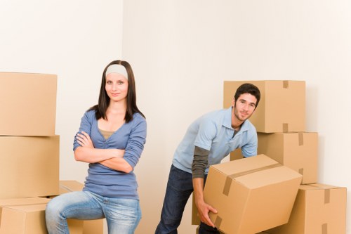 Commercial movers transporting office equipment in Lampton