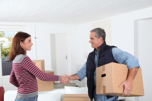 Movers loading furniture and boxes for a local Lampton house removal