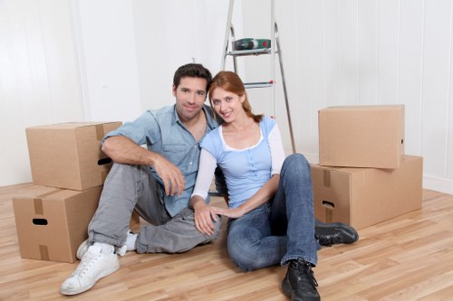 Packed moving boxes ready for collection in a Lampton home