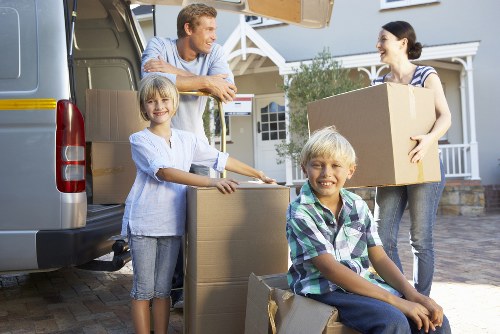Packed boxes and household items ready for removal transport