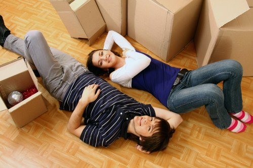 Removal van parked for a Lampton move near residential flats and parking restrictions